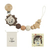 A wooden pacifier clip with a chain of brown and beige crochet beads and a small fabric pouch.