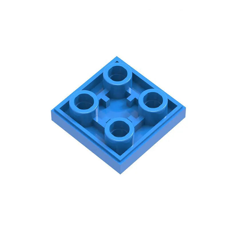 A pack of 2x2 reverse light panels for building blocks in blue.