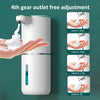 A white touchless automatic soap dispenser is shown dispensing soap onto a hand, demonstrating four levels of adjustment.
