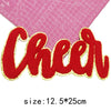 Red chenille letter patch spelling Cheer with gold glitter outline