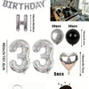 A kit for creating a balloon garland featuring silver and black foil numbers and balloons.