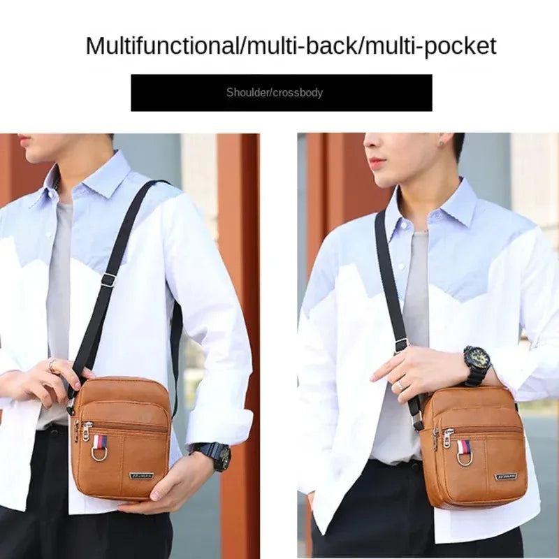 Un homme en chemise blanche et pantalon noir tient un sac bandoulière marron en cuir multifonctionnel avec plusieurs poches.