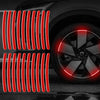 Red reflective strips installed on a car wheel rim for enhanced visibility
