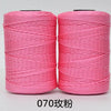 Two spools of pink 3-ply polyester knitting yarn for crochet and hand crafts