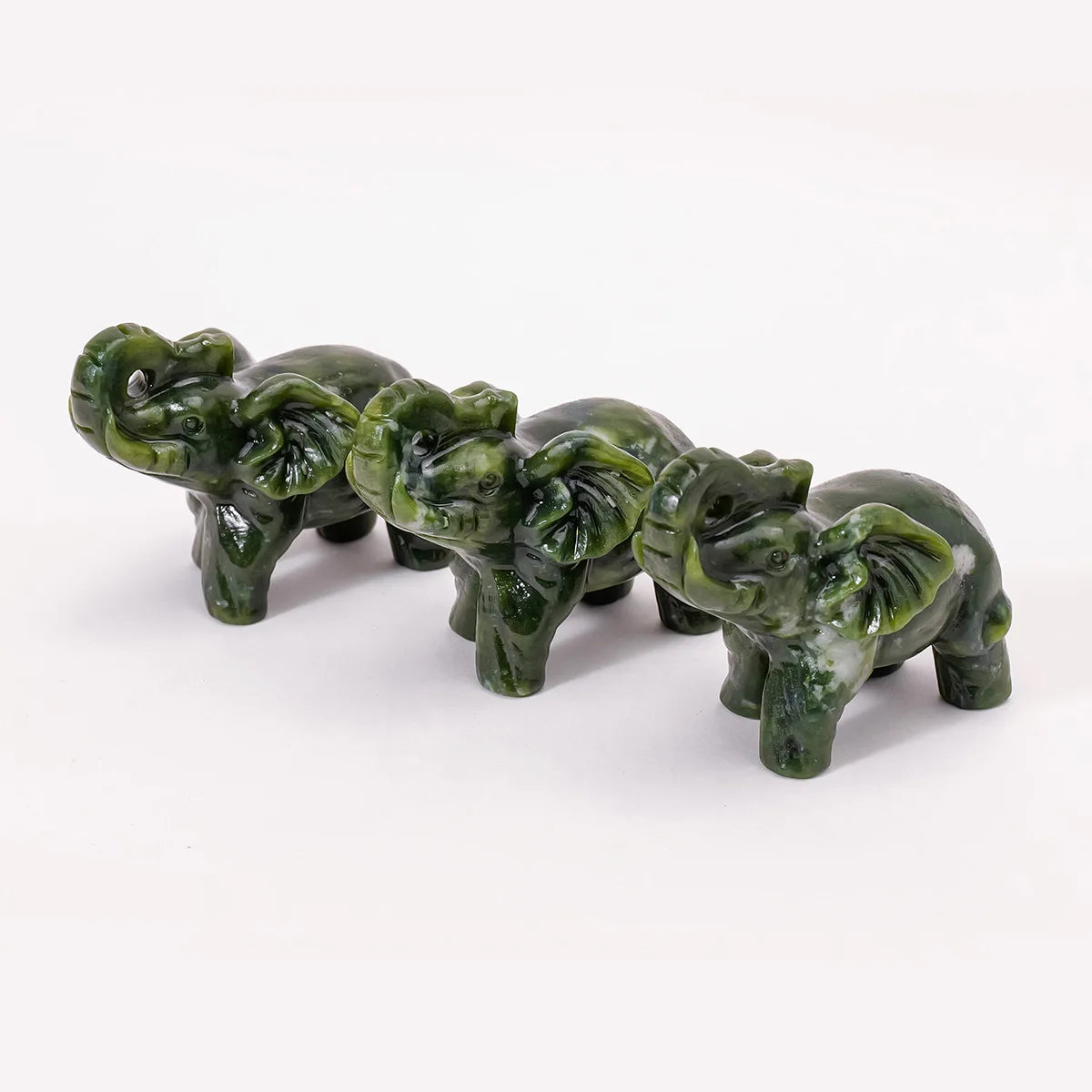 Hand-carved natural jade elephant statue in green