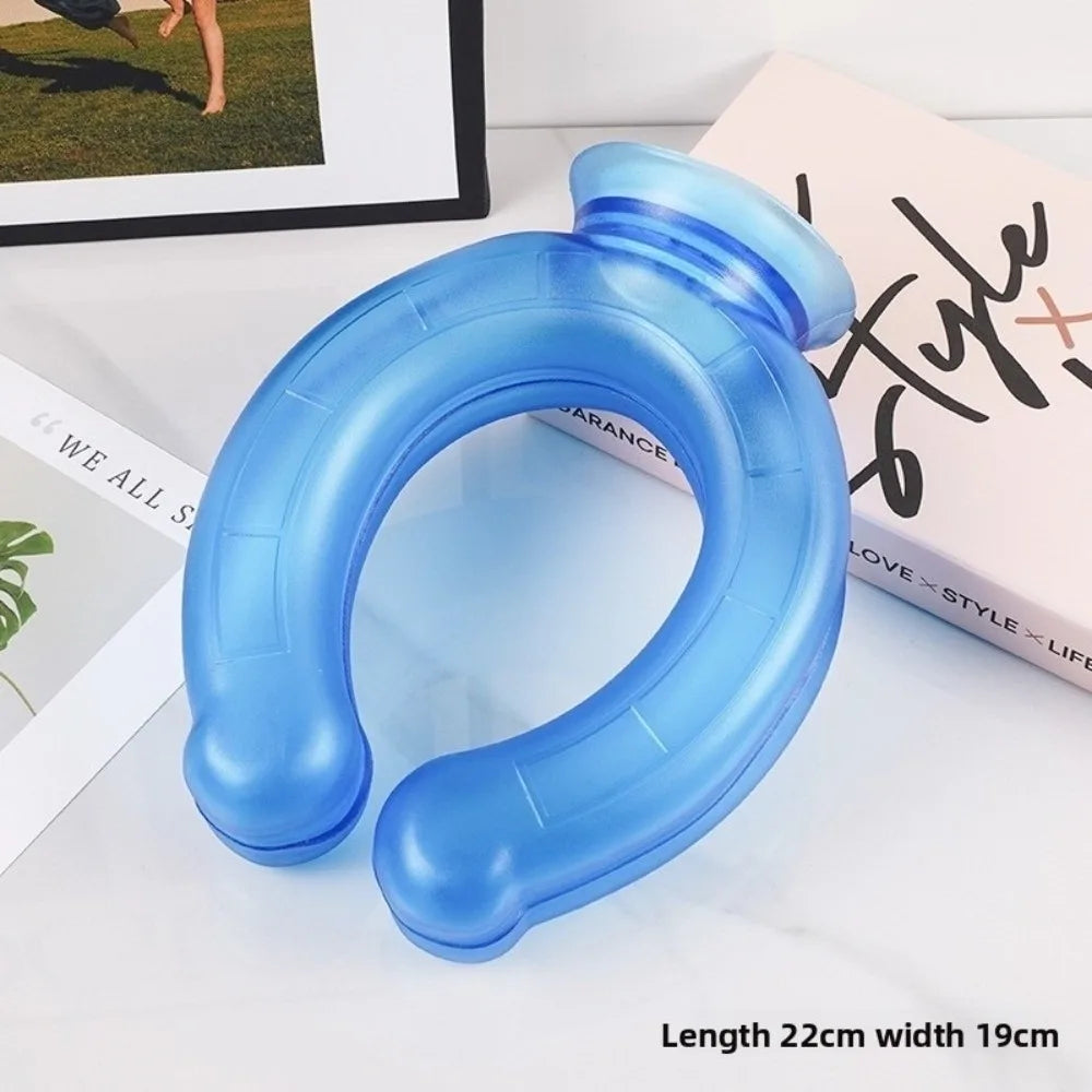 A light blue U-shaped reusable neck wrap is shown on a white surface next to a pink box.