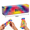 A rectangular box of salted butter squishy fidget toy in vibrant rainbow colors being held by hands.