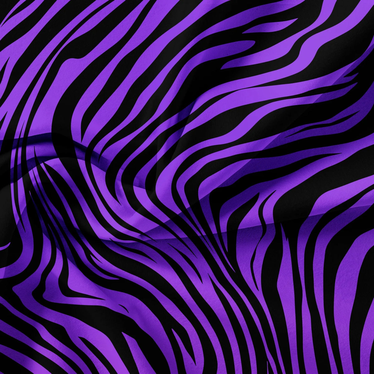 A close-up of a fabric with a bold purple and black zebra print pattern.