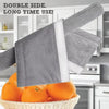 A pair of gray oil-proof refrigerator handle covers are shown next to oranges on a white basket.