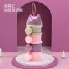 A stack of three pink and purple bear-shaped baby food storage containers.