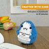 Handmade blue shark crochet figurine with an inspirational support card