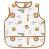 A white baby feeding bib with a sleeveless design featuring woodland animal illustrations like lions and giraffes.