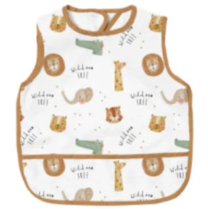 A white baby feeding bib with a sleeveless design featuring woodland animal illustrations like lions and giraffes.