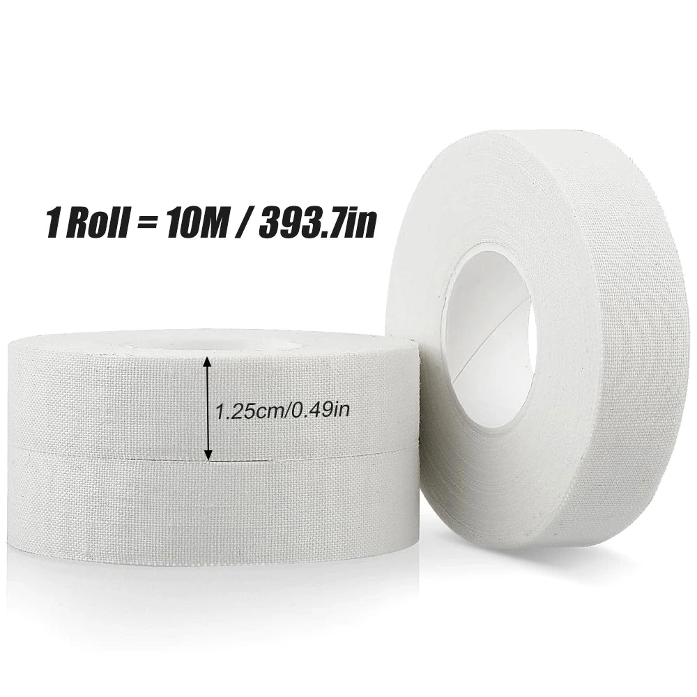Roll of white cotton athletic finger tape for climbing and martial arts