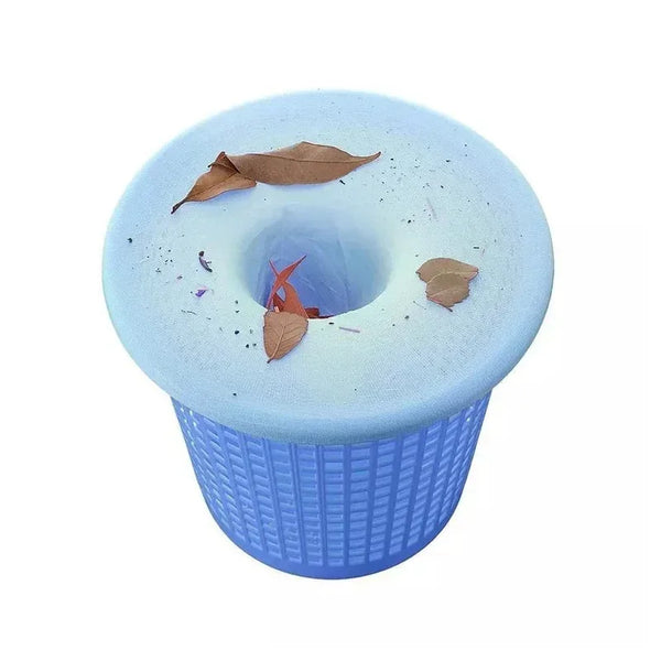 A blue reusable pool skimmer filter sock with a circular opening and dried leaves resting on the surface.