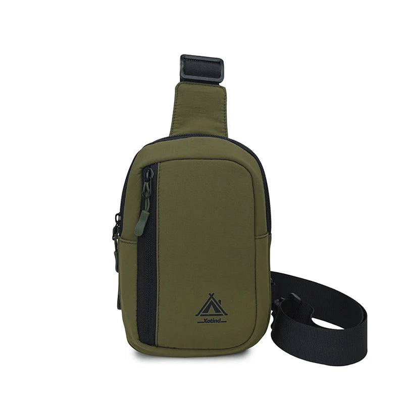 Olive green water-resistant nylon chest sling bag with a black strap.