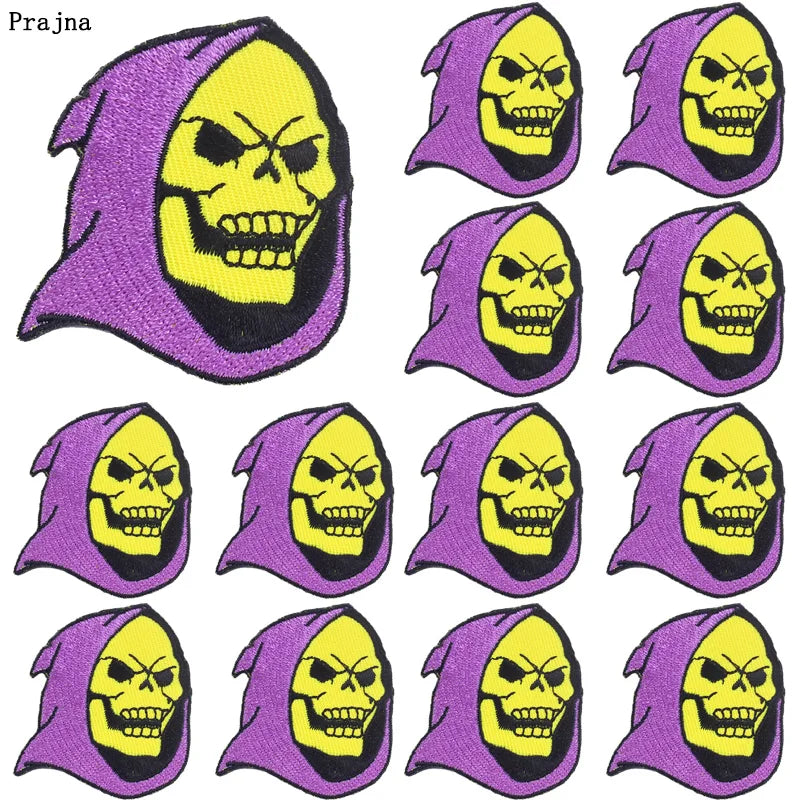 A set of ten embroidered iron-on patches featuring a purple background with a yellow skull design.