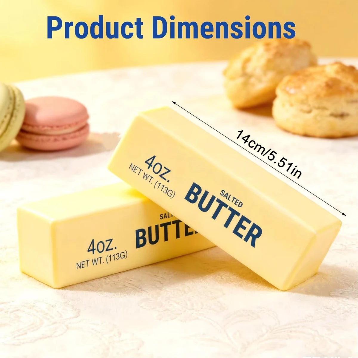 A yellow butter fidget toy bar next to macarons and baked goods, showing its dimensions.