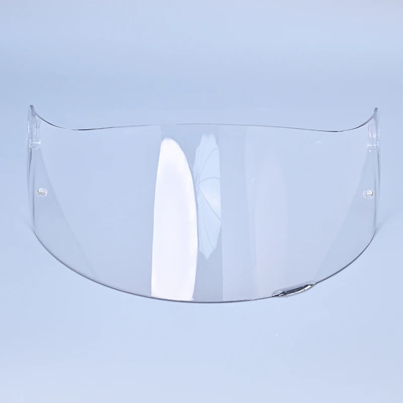 Clear motorcycle helmet visor lens shield displayed against a light blue background.
