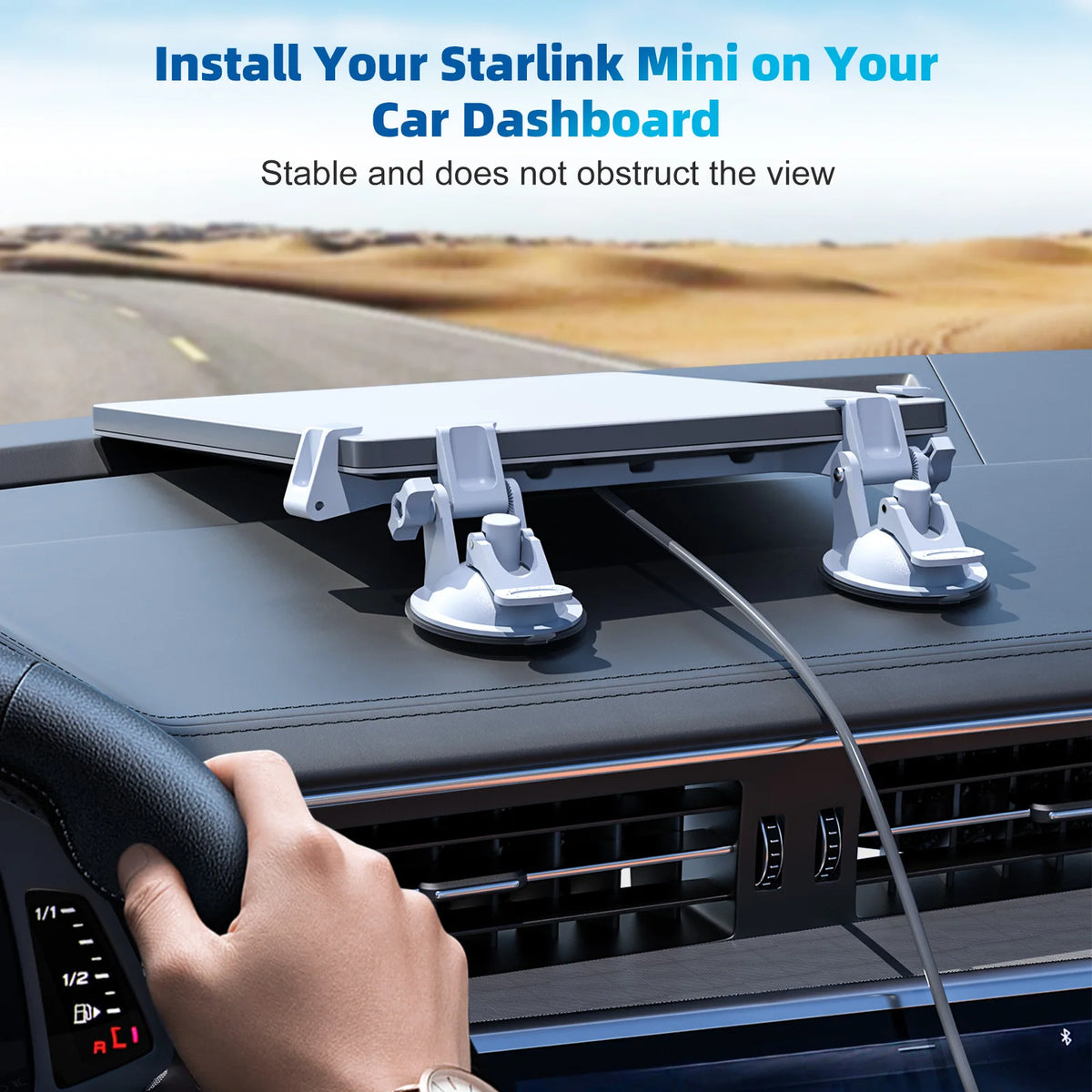 A hand installs a Starlink Mini suction cup car mount onto a vehicle's dashboard.