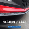 Red car front bumper with a black carbon fiber rubber anti-collision strip detail.