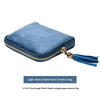 Light blue 6-layer inner jewelry bag made of velvet with a gold zipper and tassel detail