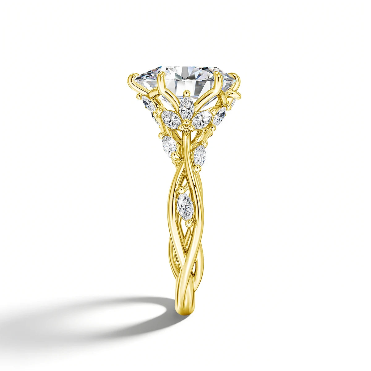 A gold filled moissanite engagement ring featuring a marquise cut stone surrounded by nature-inspired diamond accents.