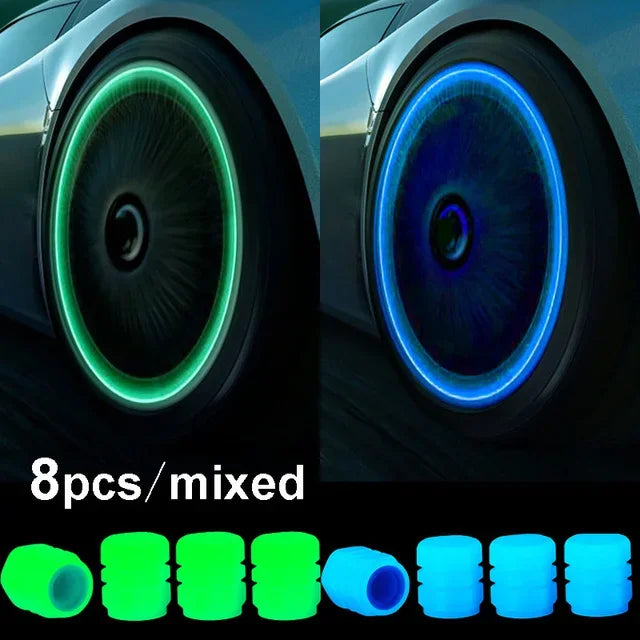A set of eight mixed glow-in-the-dark tire valve caps in various shades of green and blue.