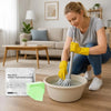 A woman is mopping a floor with a cleaning tool and yellow gloves, with packaged floor cleaning tablets nearby.