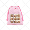 Pink drawstring storage bag featuring multiple cute capybara face patches.