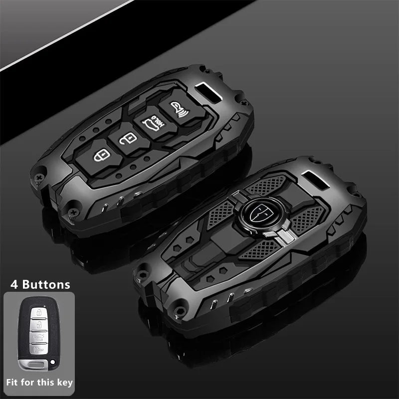 A black protective key fob cover with four buttons shown against a dark background.