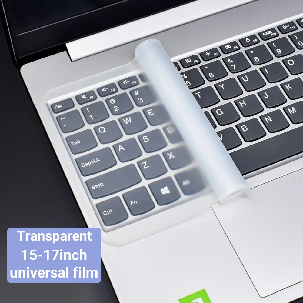 A transparent silicone film keyboard cover for a laptop, showing the keys and palm rest.