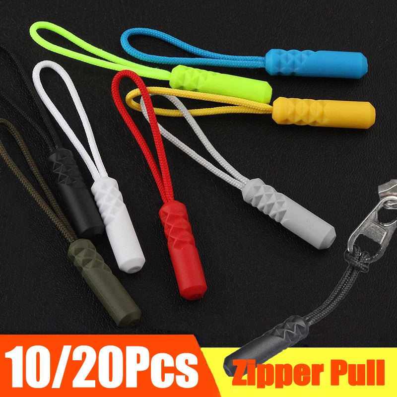 A collection of colorful replacement zipper pulls on nylon cords, including yellow, green, blue, and red options.