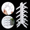 A white stackable display stand for holding sunglasses and reading glasses is shown in various angles.