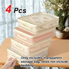 Four stacked clear storage bags for bedding with handles shown on a wooden surface.