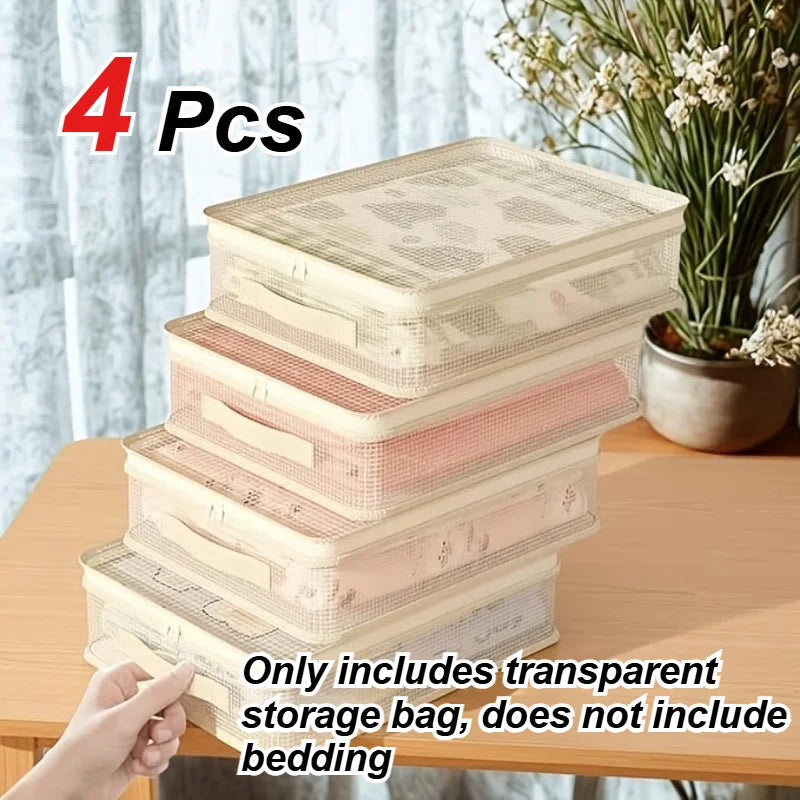 Four stacked clear storage bags for bedding with handles shown on a wooden surface.