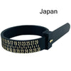 A black adjustable ring and bracelet sizer tool with numbered markings.
