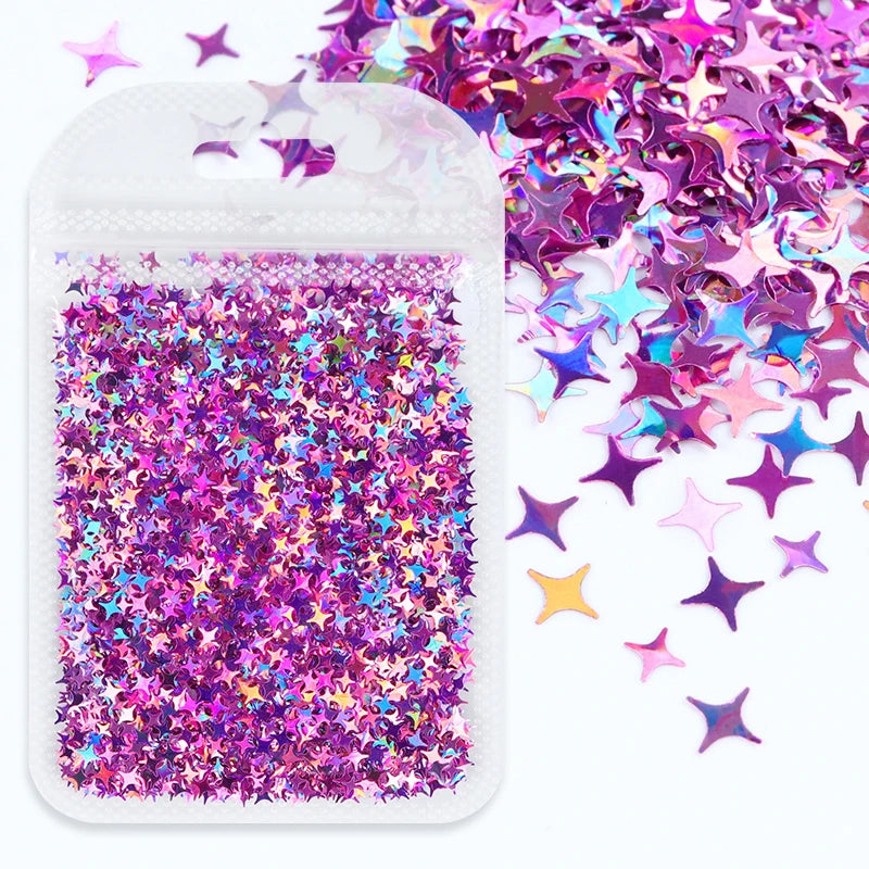 A clear plastic pouch filled with iridescent purple and pink holographic star sequins for resin crafts.