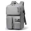 A gray travel backpack with a laptop compartment and multiple storage pockets.