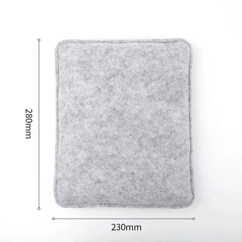 A rectangular gray needle felting mat with dimensions 230mm by 280mm.