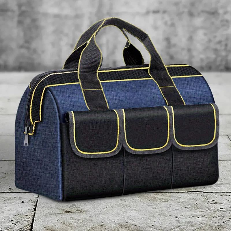 A navy blue and black heavy-duty tool organizer bag with multiple pockets and black straps.