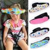 A young girl is shown wearing an adjustable baby car seat sleeping headrest with a colorful fabric strap.