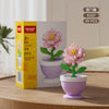 A set of 99 pink and green flower pot building blocks featuring roses, sunflowers, and carnations.