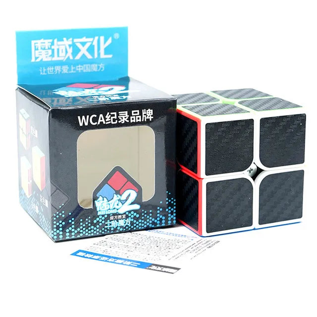 A box and disassembled cube of the MoYu Meilong 2x2 Speed Cube featuring a blue and black design.