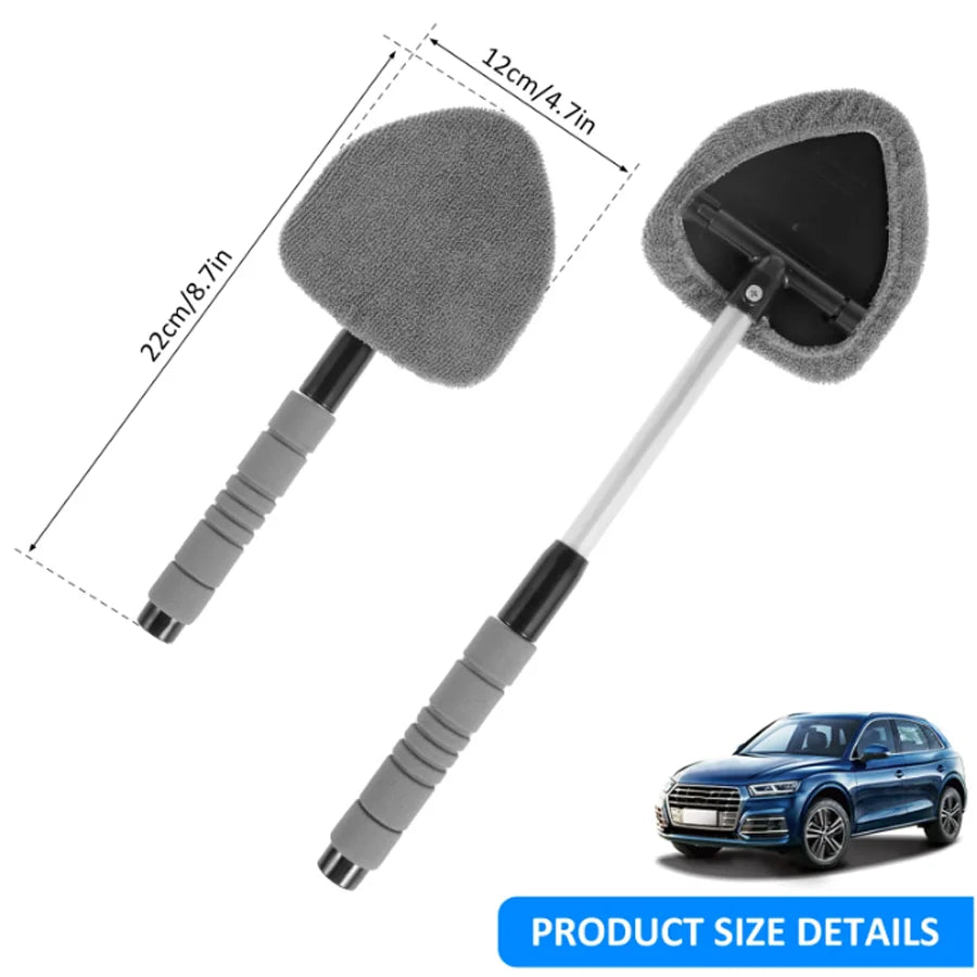 Extendable car windshield cleaner with a white handle and gray microfiber pads shown next to a blue SUV.