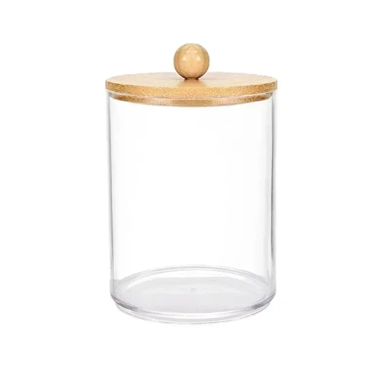 Clear acrylic apothecary jar with a wooden lid.