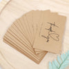 A stack of thank you for your order greeting tags in kraft paper are arranged on a light wooden surface.