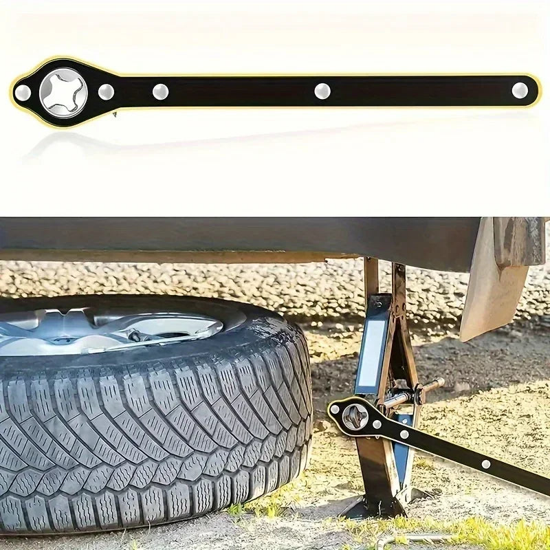 A black and gold labor-saving ratchet wrench is shown next to a tire on a wooden stand.