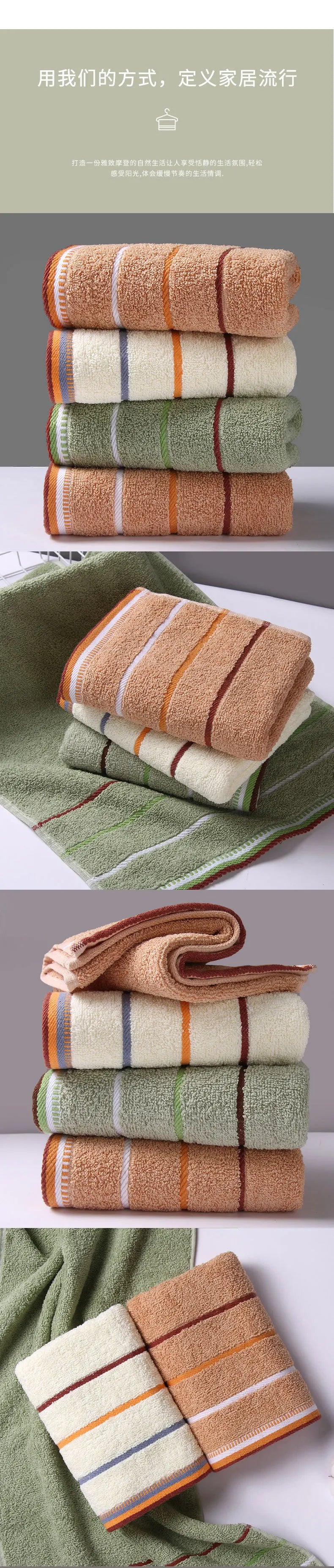 A stack of folded bath towels in various earthy tones including beige, orange, green, and brown.