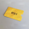 A yellow RFID protection card is shown against a light gray background.